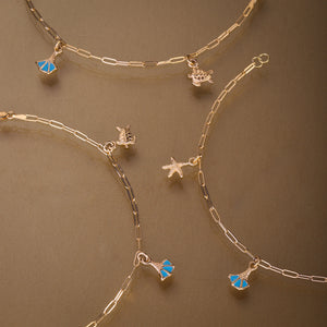 Gold 750 Galapagos 3 charms bracelet