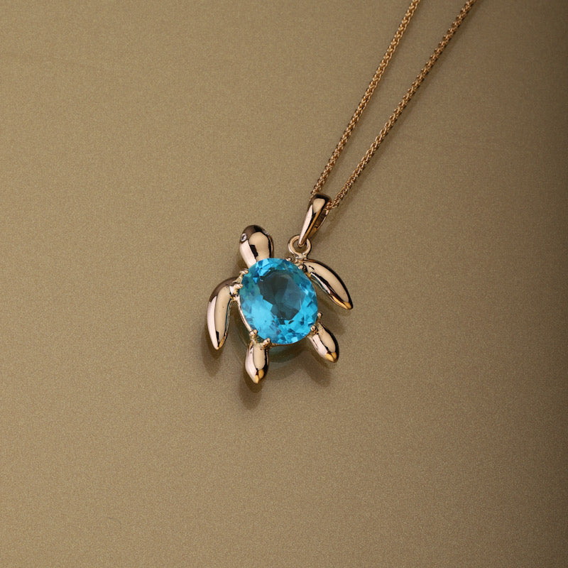 Gold 750 Sea turtle, oval shape aquamarine and diamond pendant (12mm x 14mm)