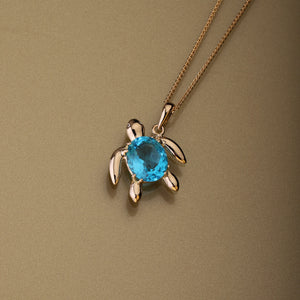 Gold 750 Sea turtle, oval shape aquamarine and diamond pendant (12mm x 14mm)