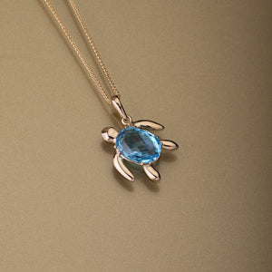 Gold 750 Sea turtle, oval shape aquamarine and diamond pendant (16mm x 12mm)