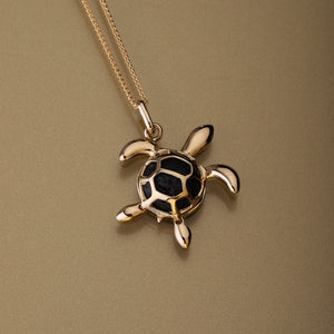 Gold 750 Black Natural Lava stone Sea turtle pendant calado