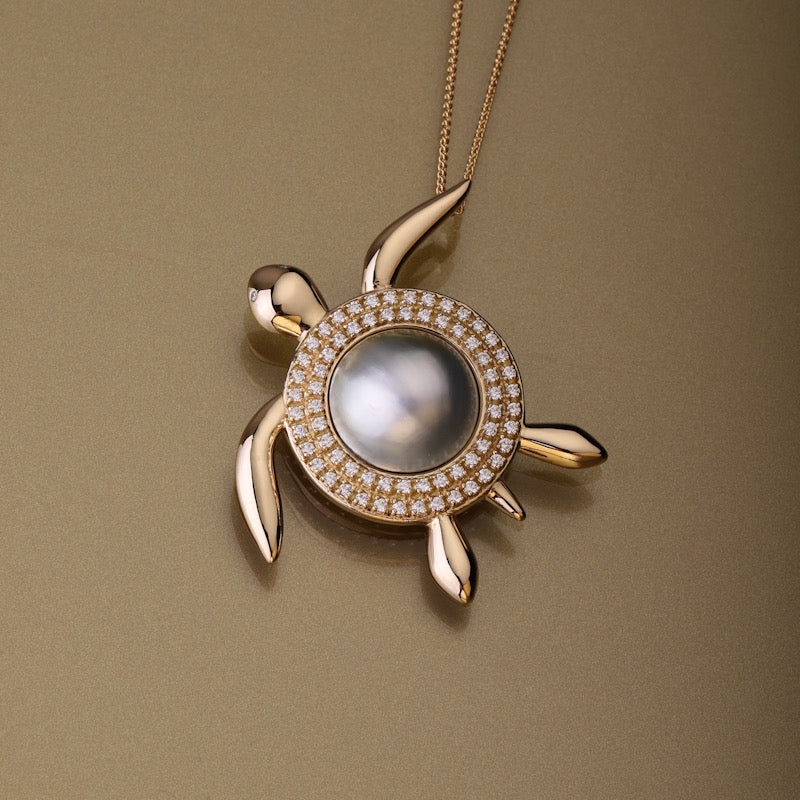 Gold 750 Sea turtle south sea pearl and diamond pendant