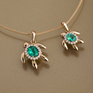 Gold 750 Sea turtle, oval shape emerald and diamond pendant