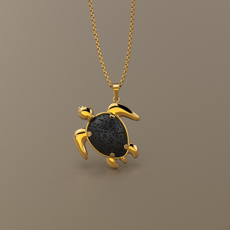 Gold 750 Black Natural Lava stone sea turtle pendant